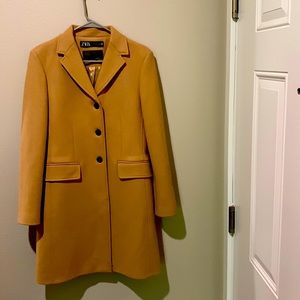 Warm and cozy winter coat.  Polyester and viscose, size S.  Zara.